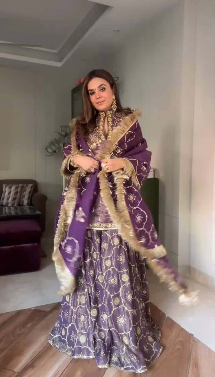 "Luxurious Pur Twil Gold Net Embroidered Suit Set with Sequence Work and Fancy Lace Border"