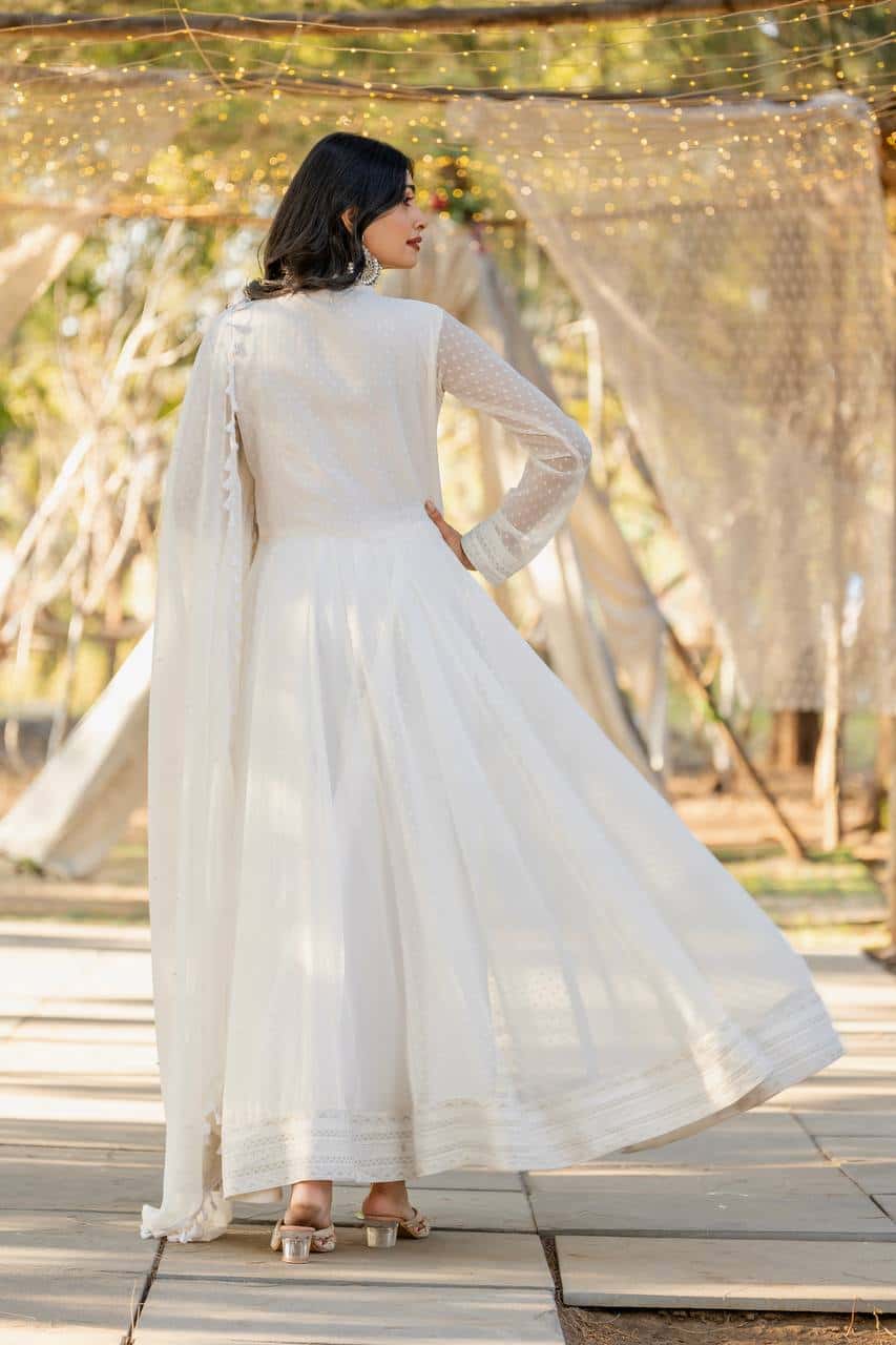 "Exquisite Heavy Faux Georgette Anarkali Gown Set with Embroidery, Tassels, and Moti Work"