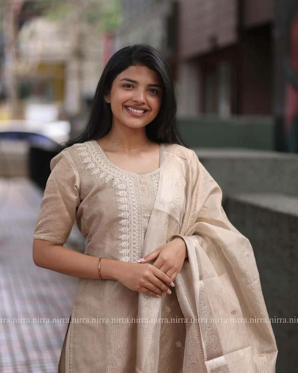 "Sophisticated Muted Light Brown Embroidered Gown with Foil Work Dupatta"