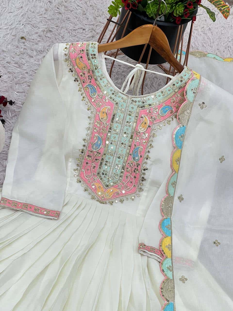"Elegance in Every Thread: Heavy Chinon Silk Top with Multicolor Embroidery & Sequence Work"