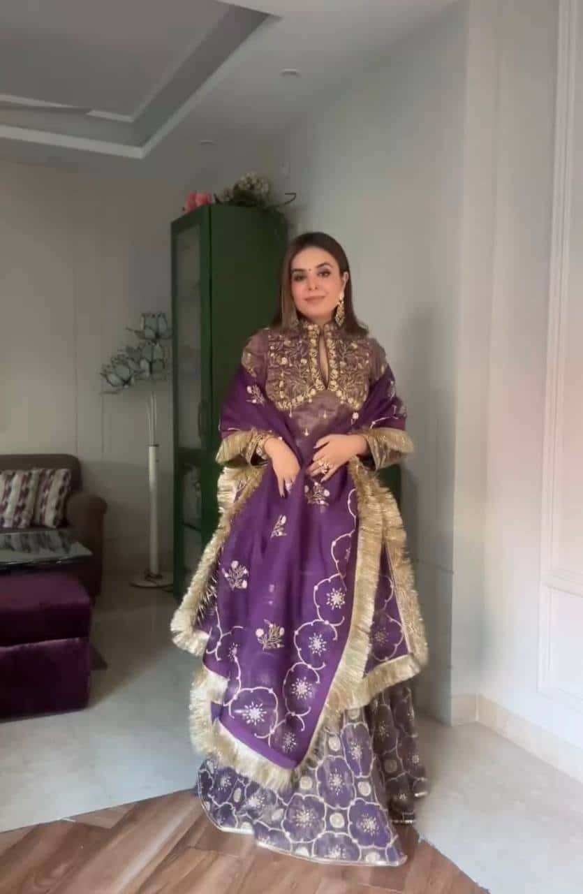 "Luxurious Pur Twil Gold Net Embroidered Suit Set with Sequence Work and Fancy Lace Border"