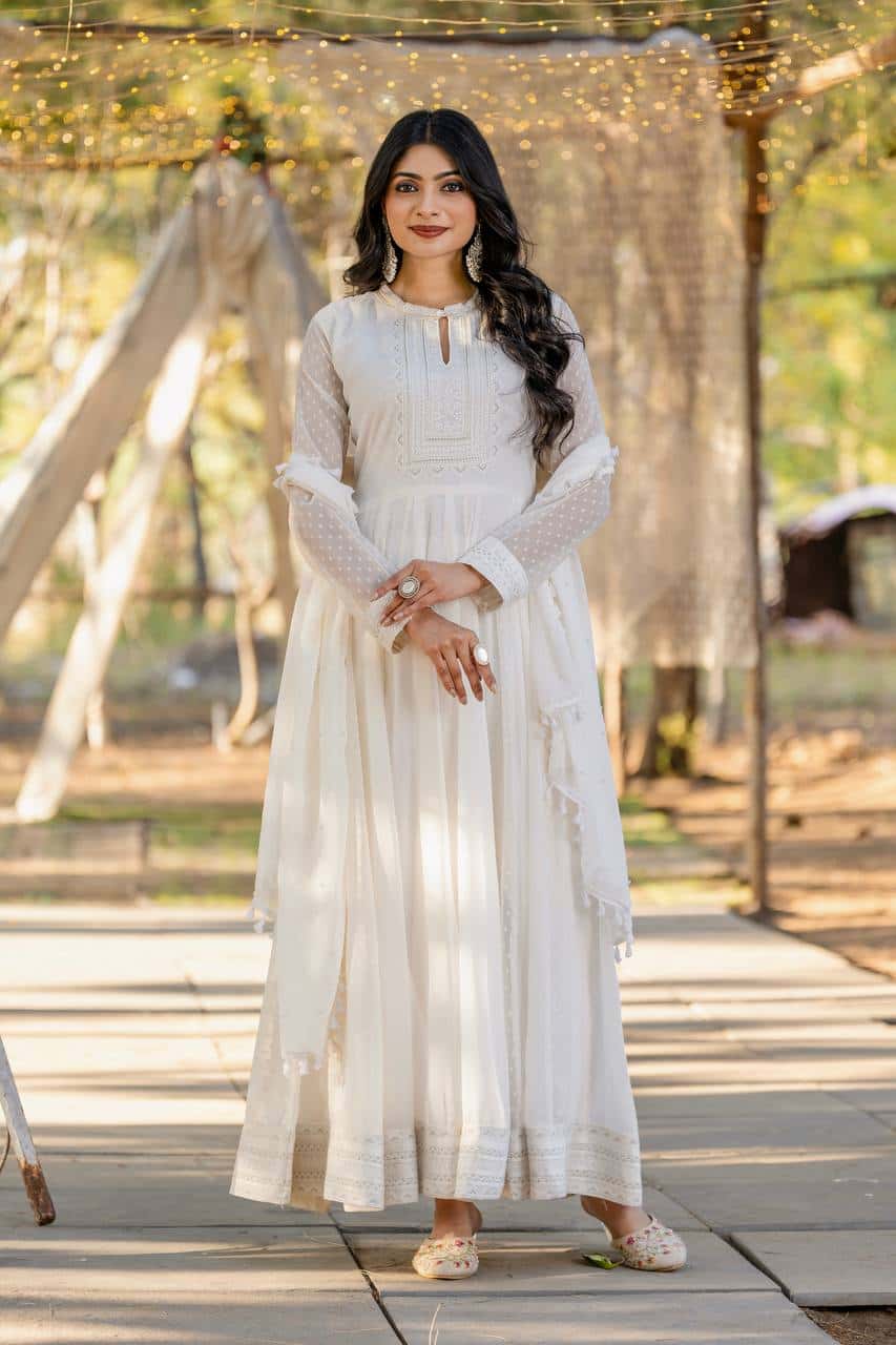 "Exquisite Heavy Faux Georgette Anarkali Gown Set with Embroidery, Tassels, and Moti Work"
