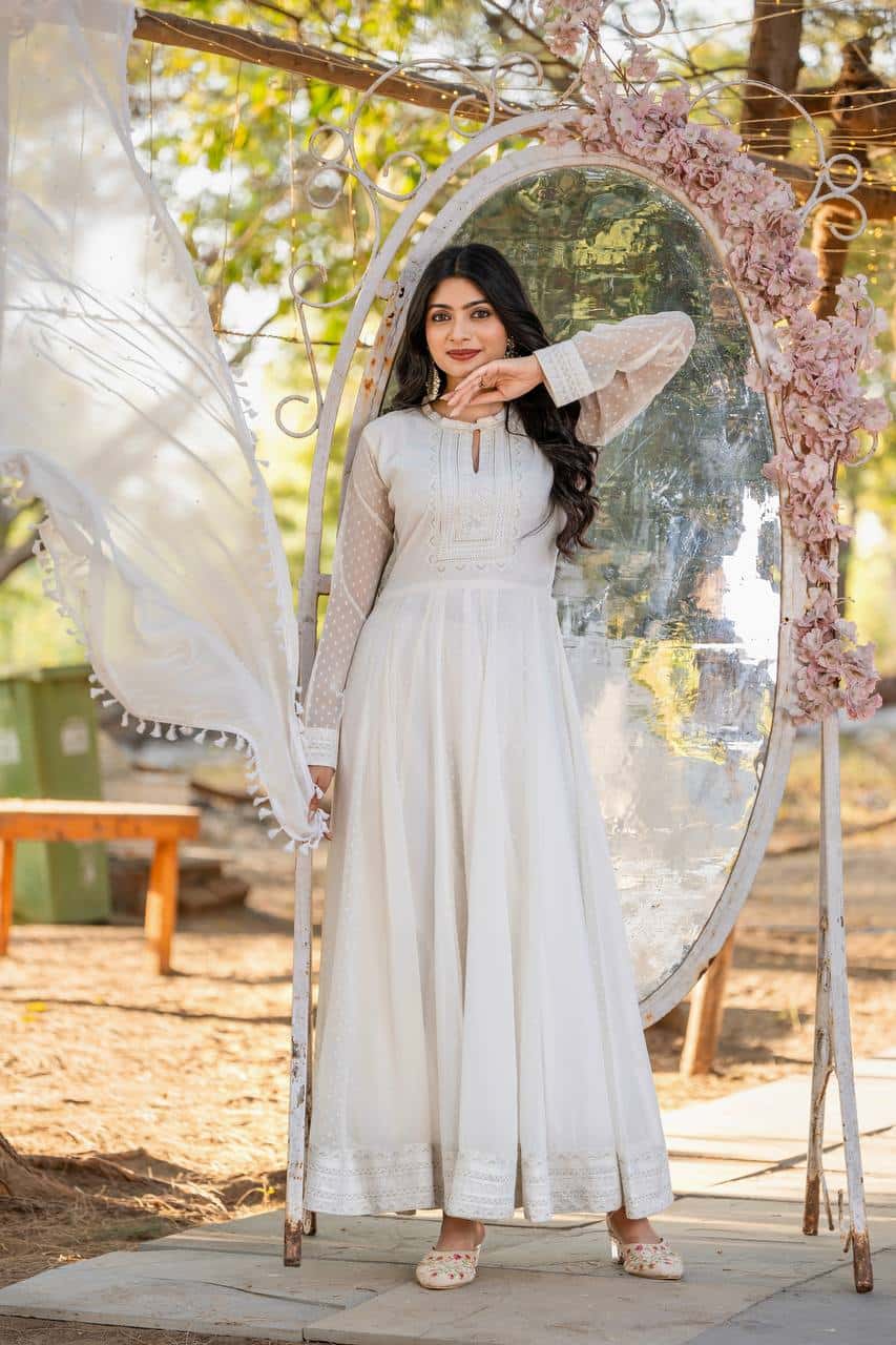 "Exquisite Heavy Faux Georgette Anarkali Gown Set with Embroidery, Tassels, and Moti Work"